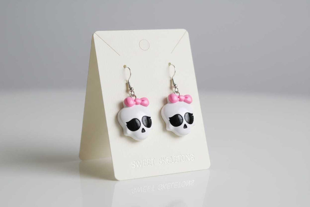 Skull Earrings with Pink Bow – Creepy Goth Jewelry