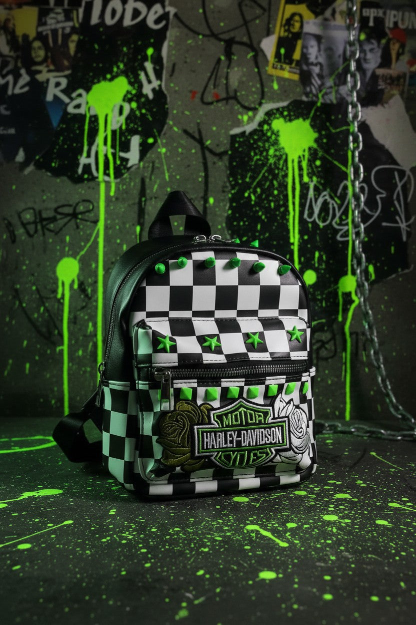 Hempin Mayhem black and white checkered mini backpack with neon green studs, spikes, and Harley-Davidson patch