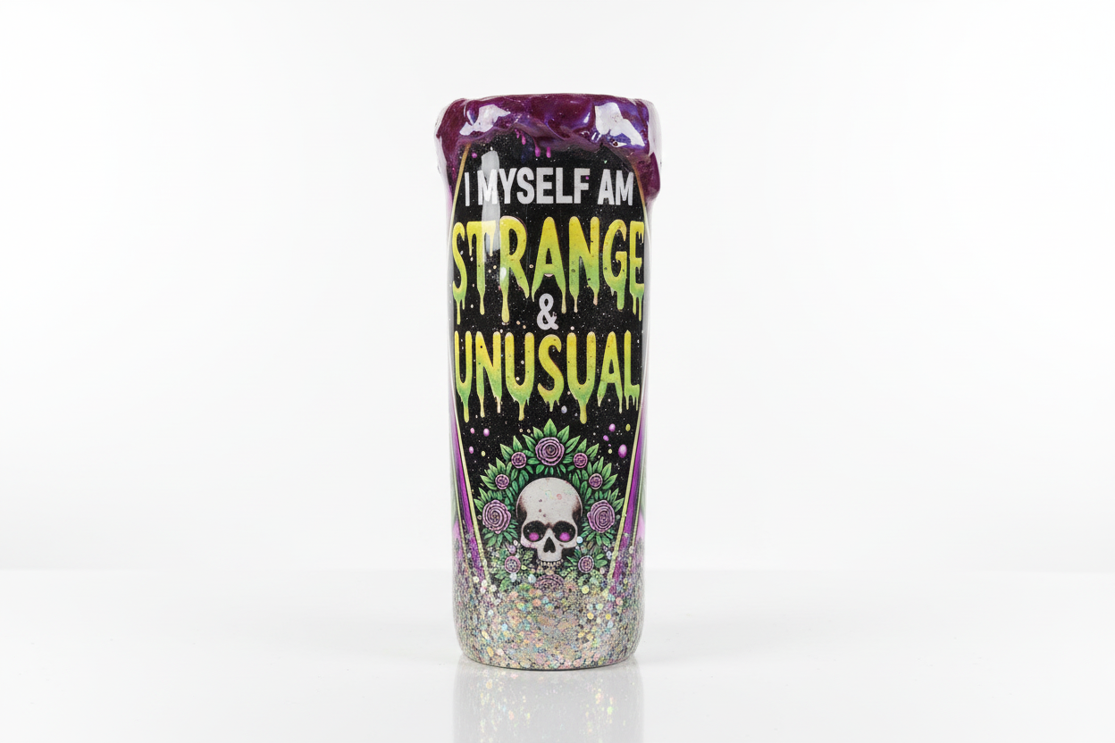 Tumbler with text 'I myself am strange and unusual' on a white background